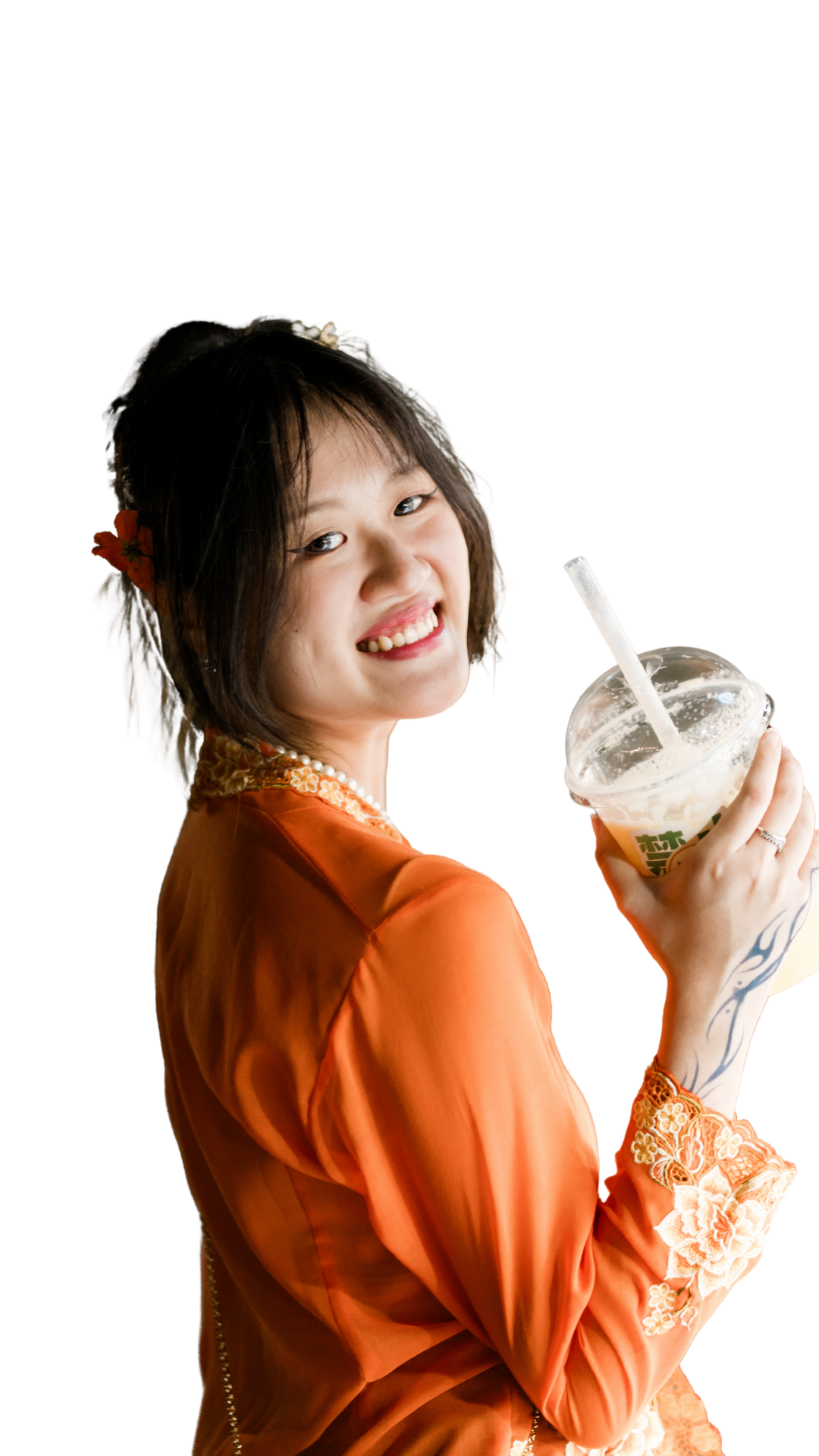 Lynn Tang in an orange outfit holding a drink
